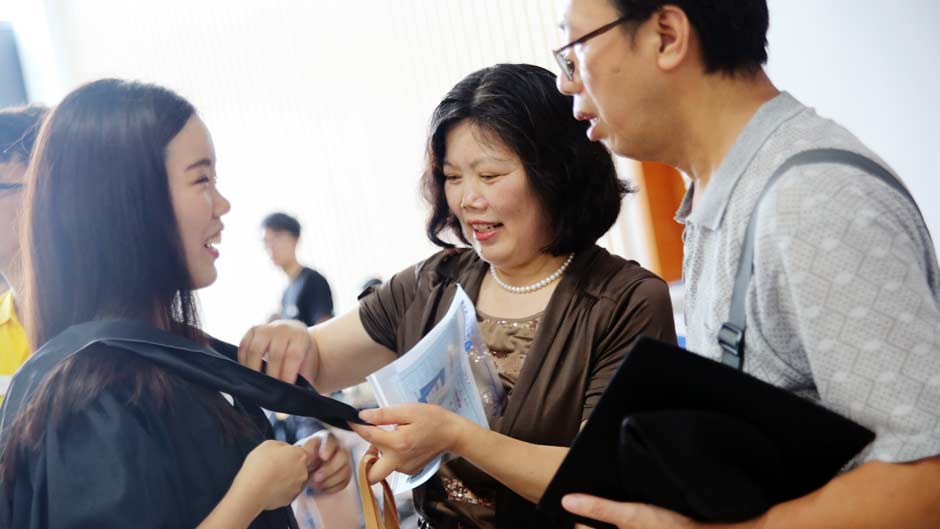 Students, parents and supporters celebrate graduation together