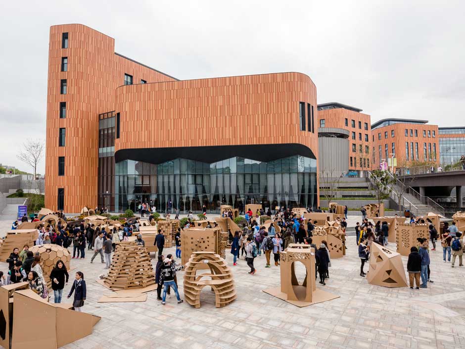 Cardboard shelter activity demonstrates research-led teaching